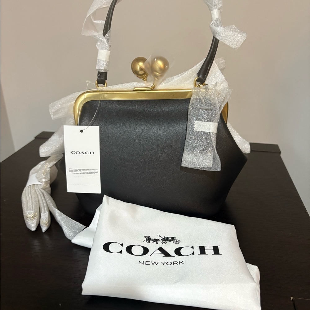 New and Authentic Coach Kisslock Frame 16 Black and Gold Bag with chain